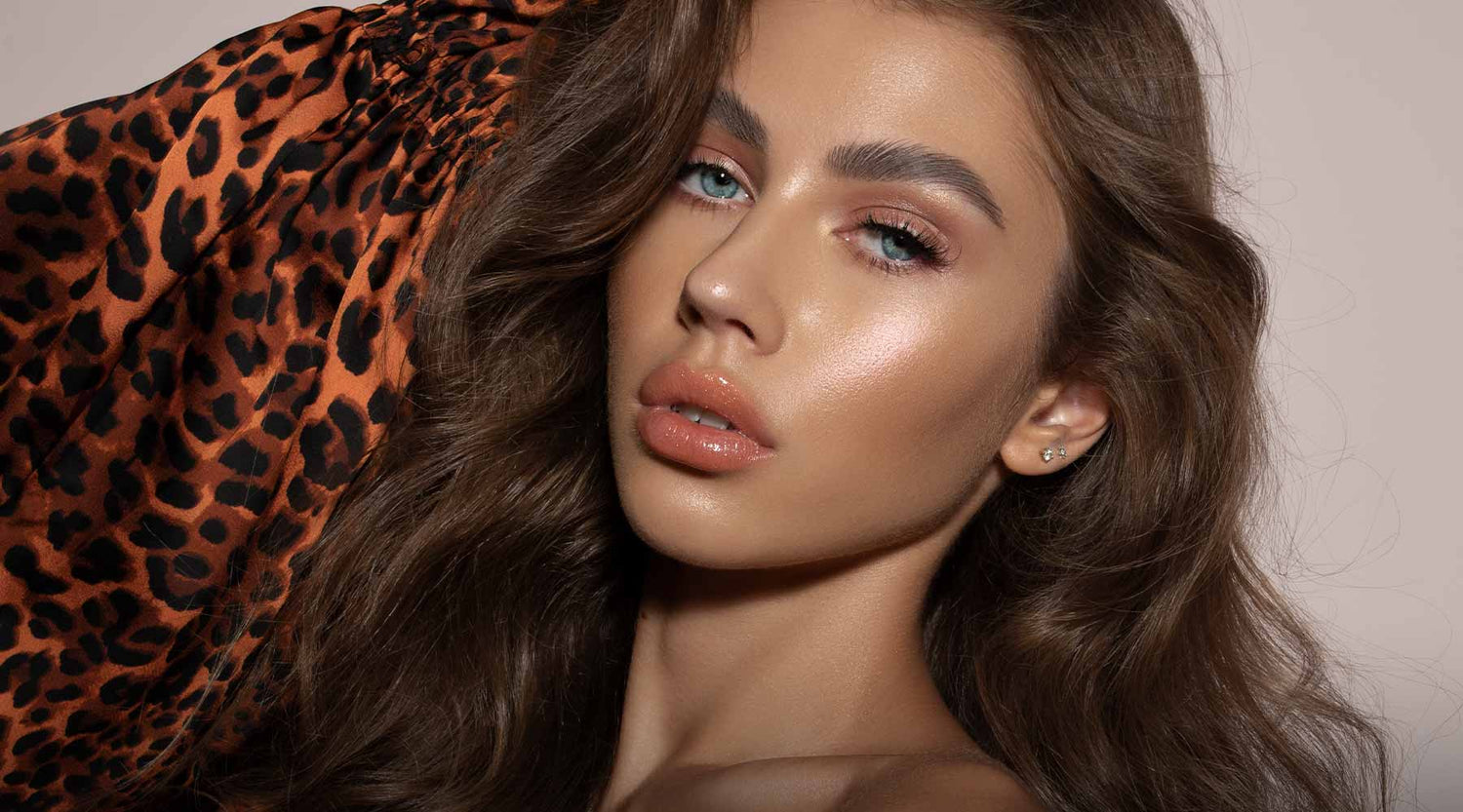 Gorgeous model with bronze and glowing makeup.