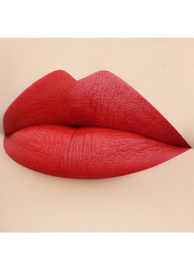 Aristocrat (classic red shade) lipstick swatch on paler skin
