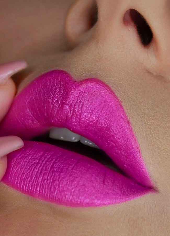 Hazardous (vibrant purple shade) lipstick swatch