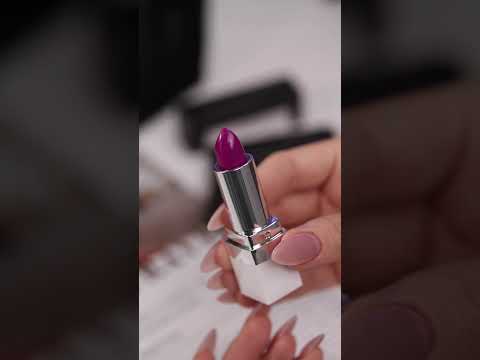 Video showing Hazardous (vibrant purple) Lipstick + hand swatch of colour