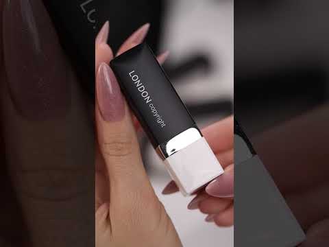 Video showing Etiquette (peachy pink) Lipstick + hand swatch of colour